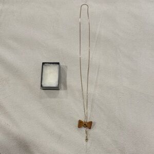 Elegant Adjustable Gold Bow Pendant Necklace